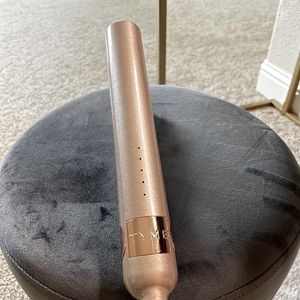 Rose gold TYME curling iron and straightener